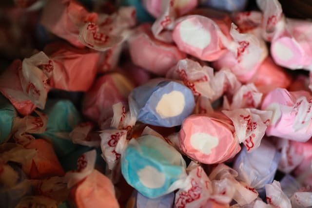 Assorted saltwater taffy candies wrapped in colorful paper